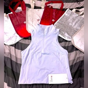 Lululemon tight fit lined half zip tank size medium NWT!